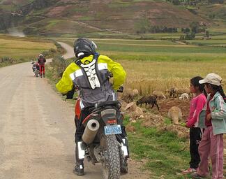 Girls Watching Riders in Peru