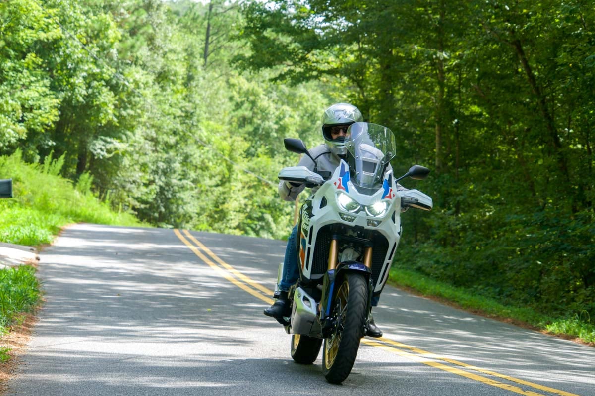 2024-honda-africa-twin-dct-flying-down-the-road