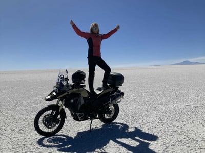 Heroic pose on an adv motorcycle for the salt flats