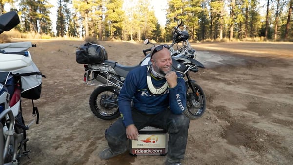 Eric uses motorcycle bags as a seat