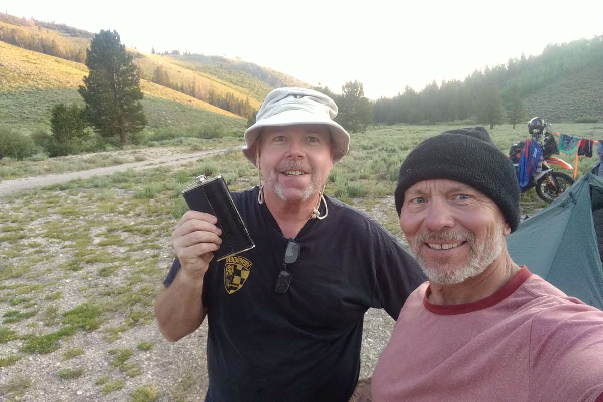 Mack and Jeff Jones happy smiling at camp site on the Norcal BDR