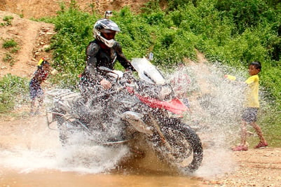 Motorcycle Splashing Kids Laos