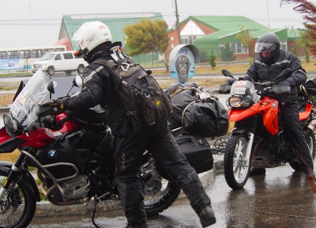 Eric on his motorcycle getting drenched in rain.