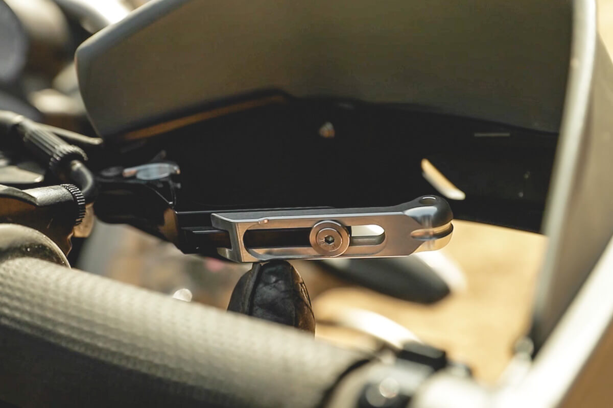Close up of adjustable clutch lever motorcycle accessory.