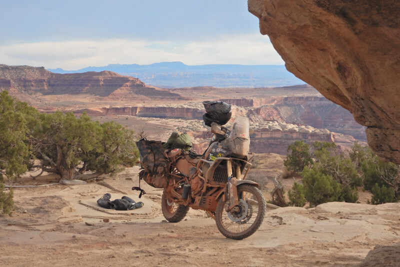 Parked motorcycle looking over the Moab Desert