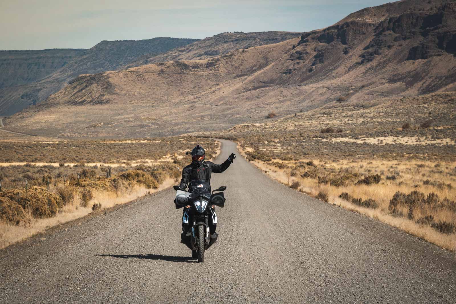 Adventure Rider saying hello with a beautiful backdrop of the steen mountains