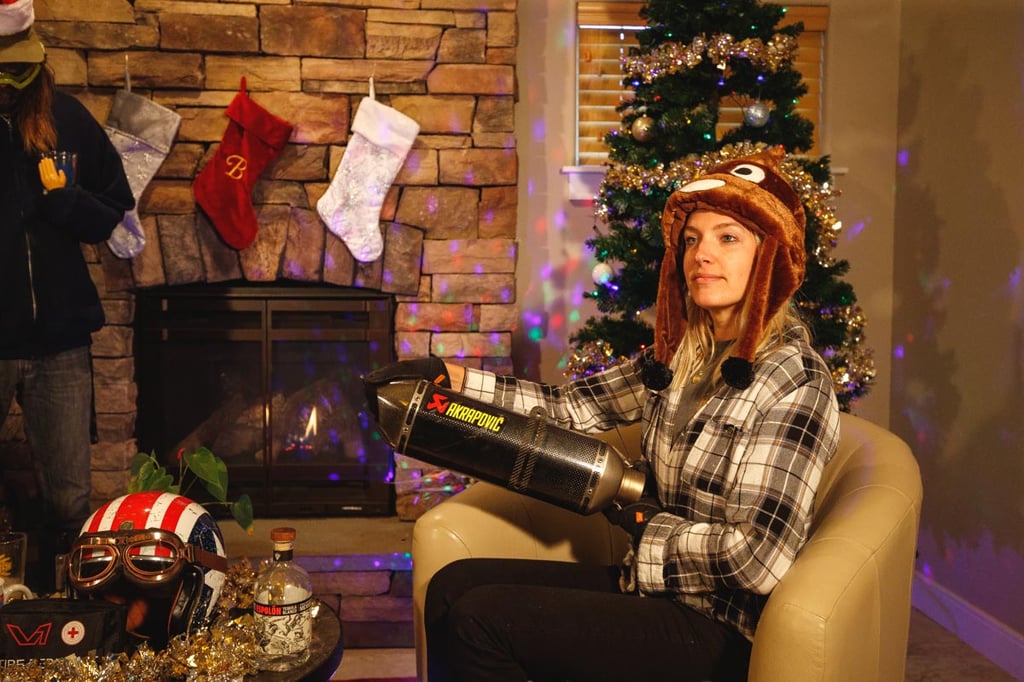 Grace modeling the new Akrapovic slip on exhausts as a gift for motorcyclists.