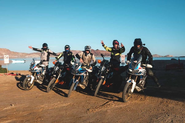 Group of riders parking too close to eachother just to get a photo. 