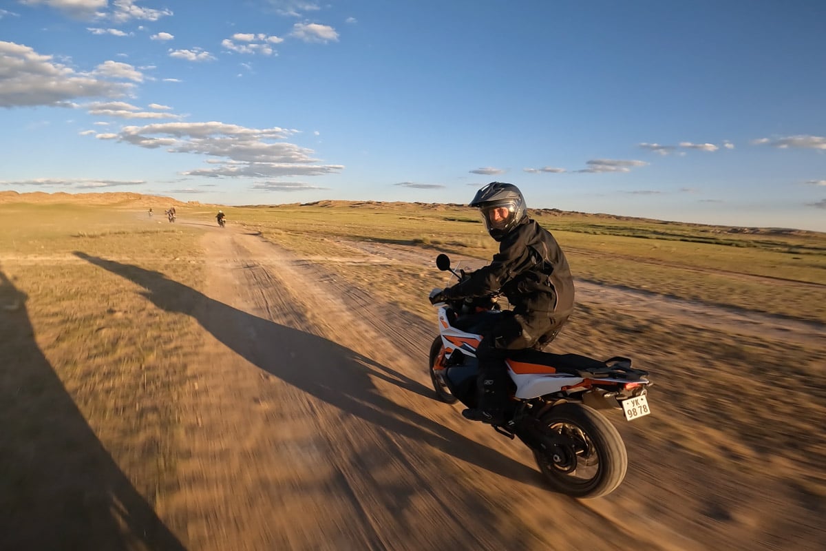 charles smiling back as he rips through mongolia