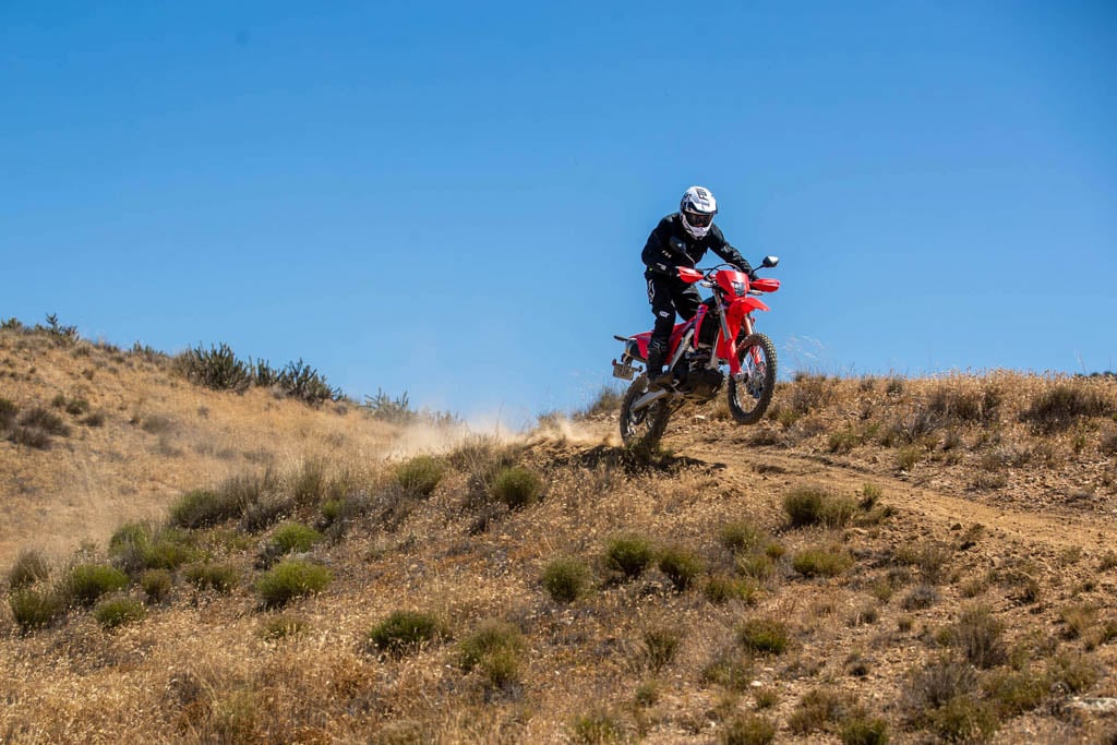 crf450rl dual sport motorcycle blazing new dirt trails.