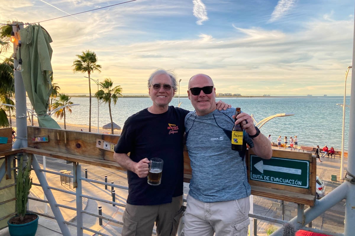 customers-smiling-at-bar-in-cabo-baja-mexico