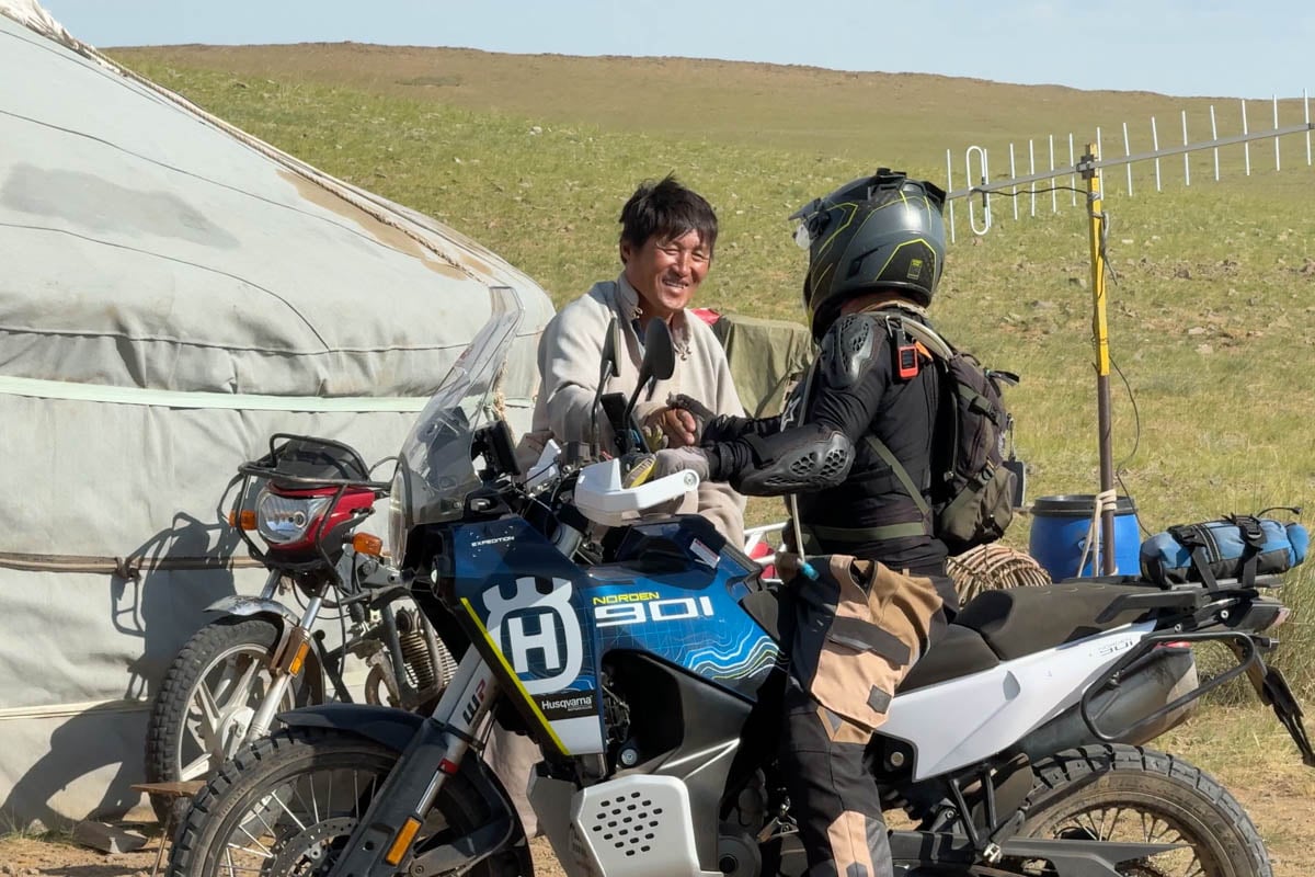 dermot customer shakes hands with local mongolian outside his ger-1