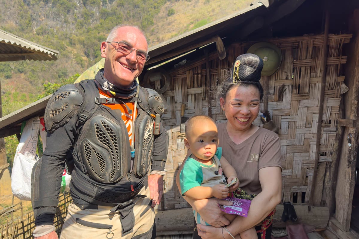 dermot-with-local-and-baby-at-home-vietnam