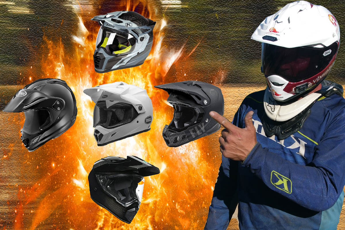 Eric pointing at some of his favorite dual sport helmets.