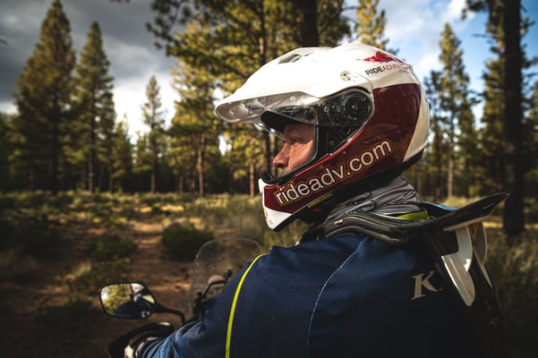 Eric Lange the reviewer on the CB500x looking to the left into the distance while riding