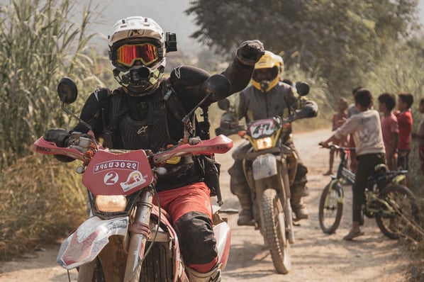 garrett-in-nepal-with-ride-adventures-wearing-red-mirrored-goggles