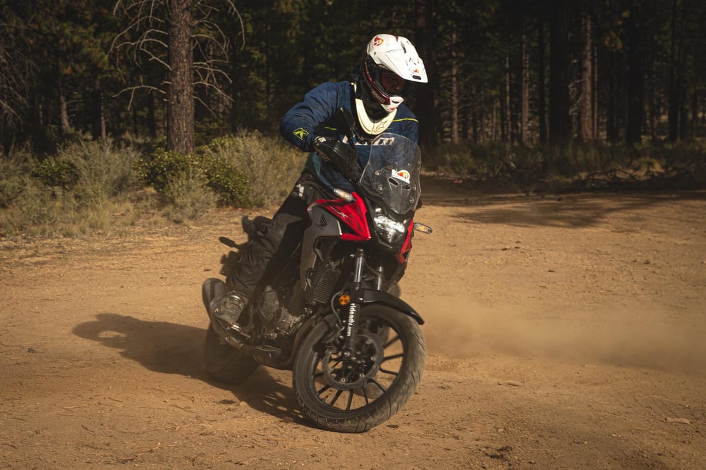 Honda CB500X making cookies in the dirt.