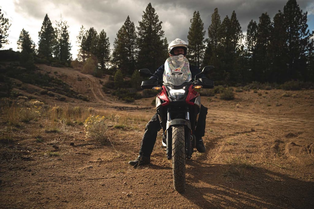 Eric taking a break on the Honda CB500X after a descent.