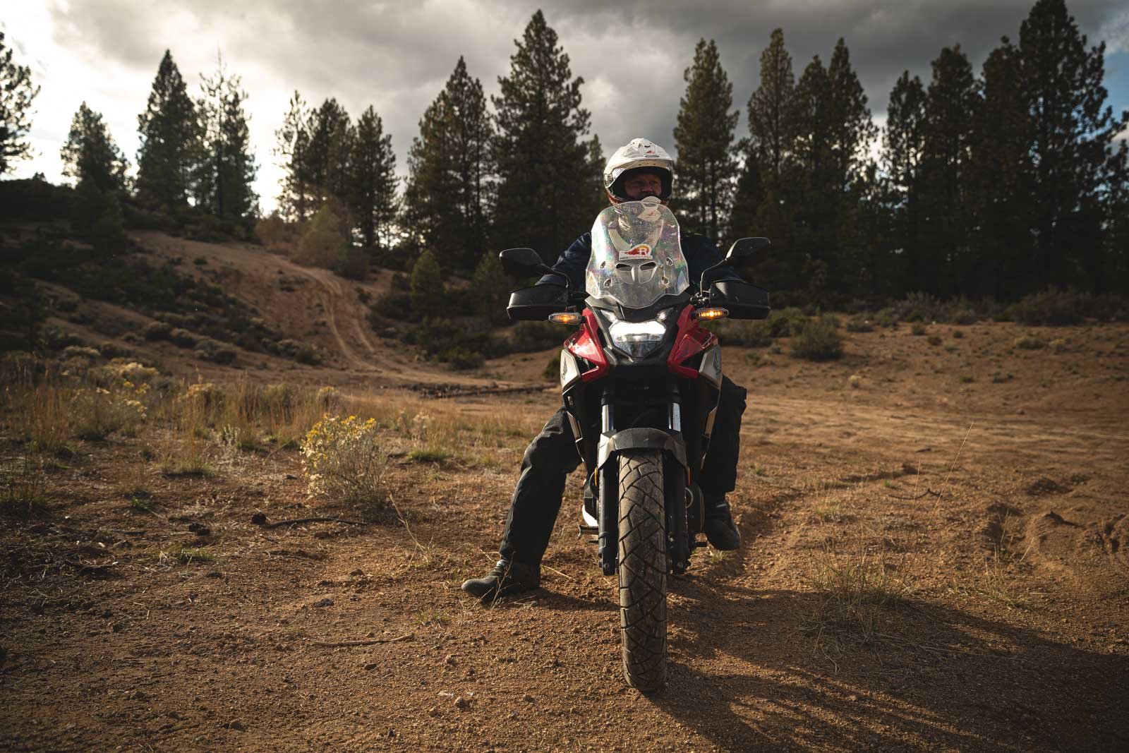 Rider looking out into the horizon with the trail behind