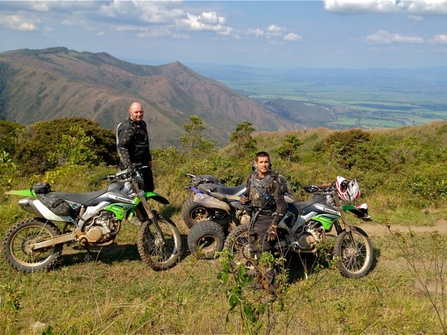 Dirt Bikers taking a break to dry off the sweat.