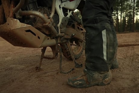 Eric showing how not to crush your toes while taking your motorcycle off the centerstand.