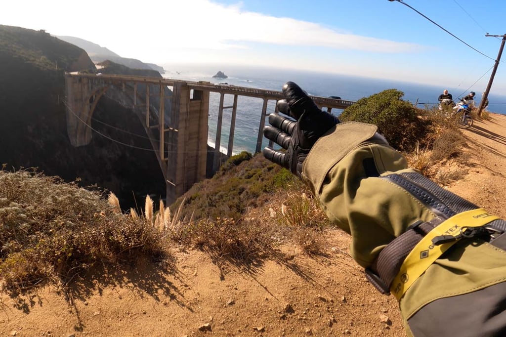 Garrett looking onto Bixby Bridge from a near by dirt road.