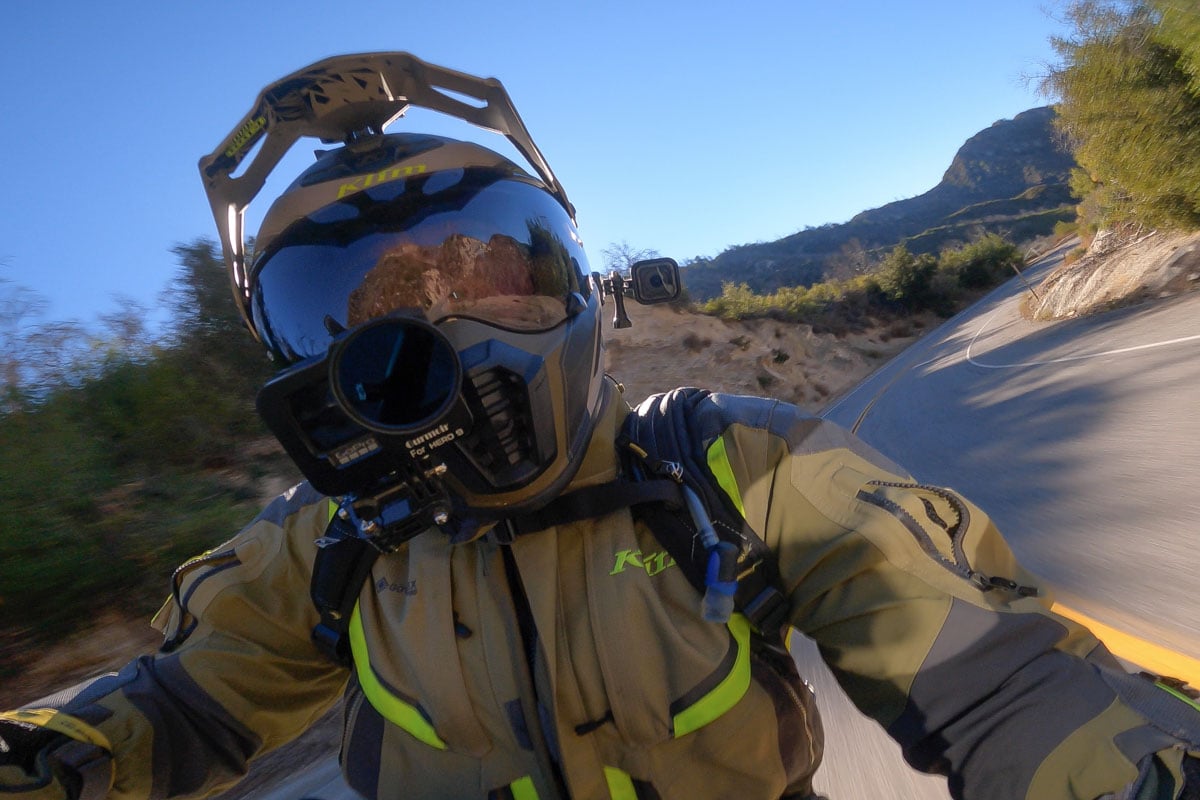 Garrett our videographer with three cameras on his Klim Krios Pro dual sport helmet along the California coast.