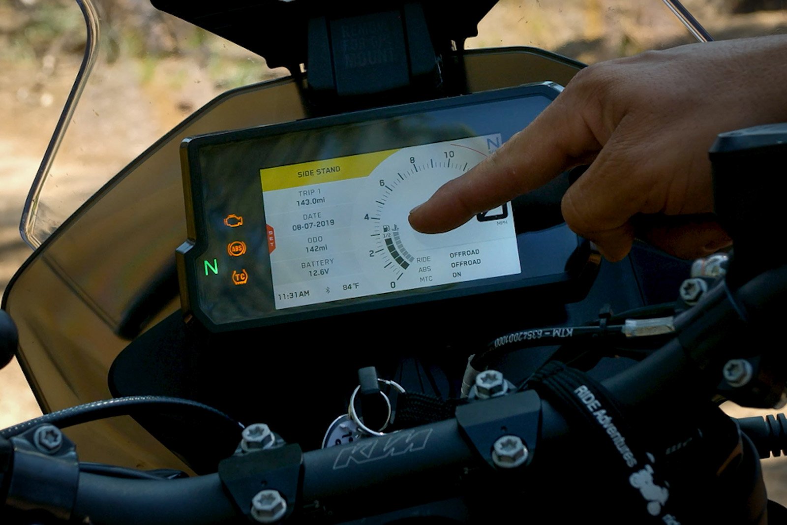 Eric points out the KTM 790's half fuel gauge