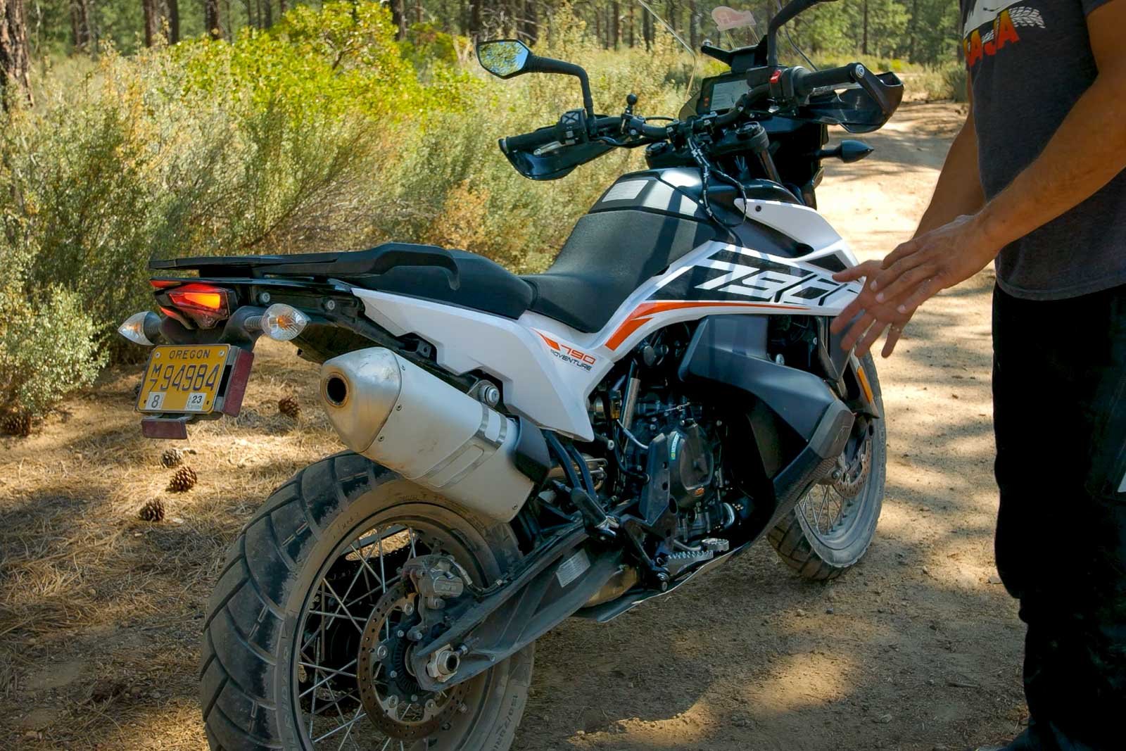 Eric pointing out the wheelbase on the KTM 790 Adventure