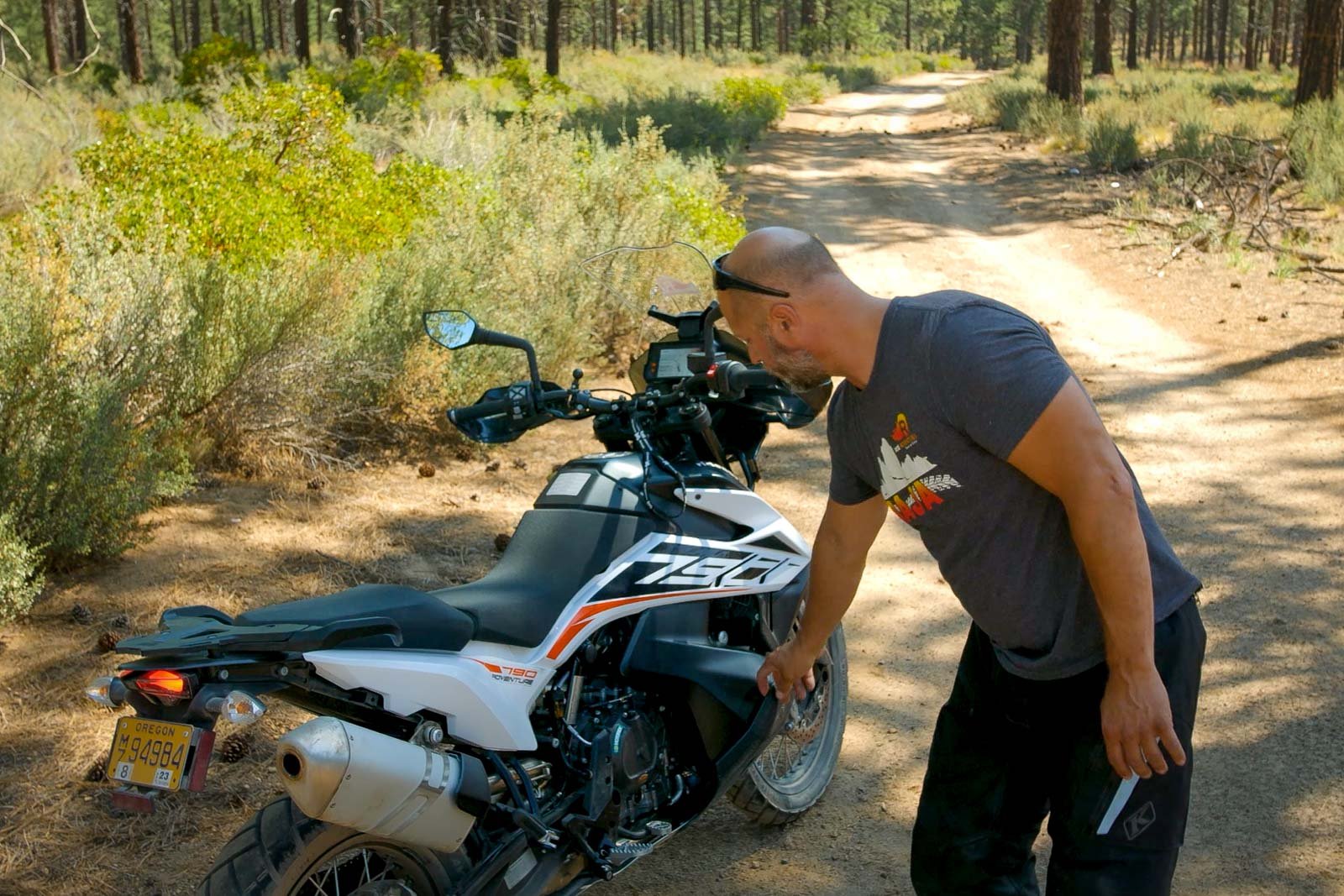 Eric points out the KTM 790's low slung fuel tank