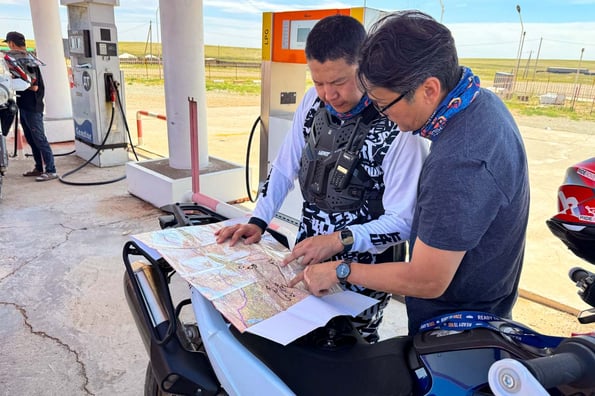 looking over the plans on the map