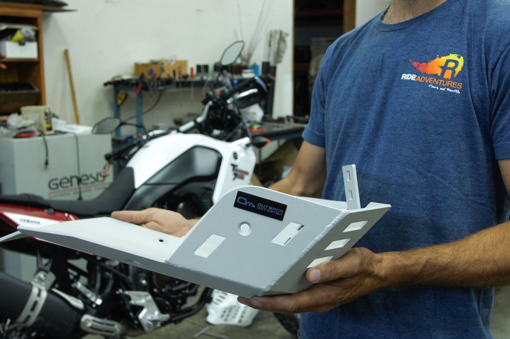 Tyler installing Outback Motorteks skid plate.
