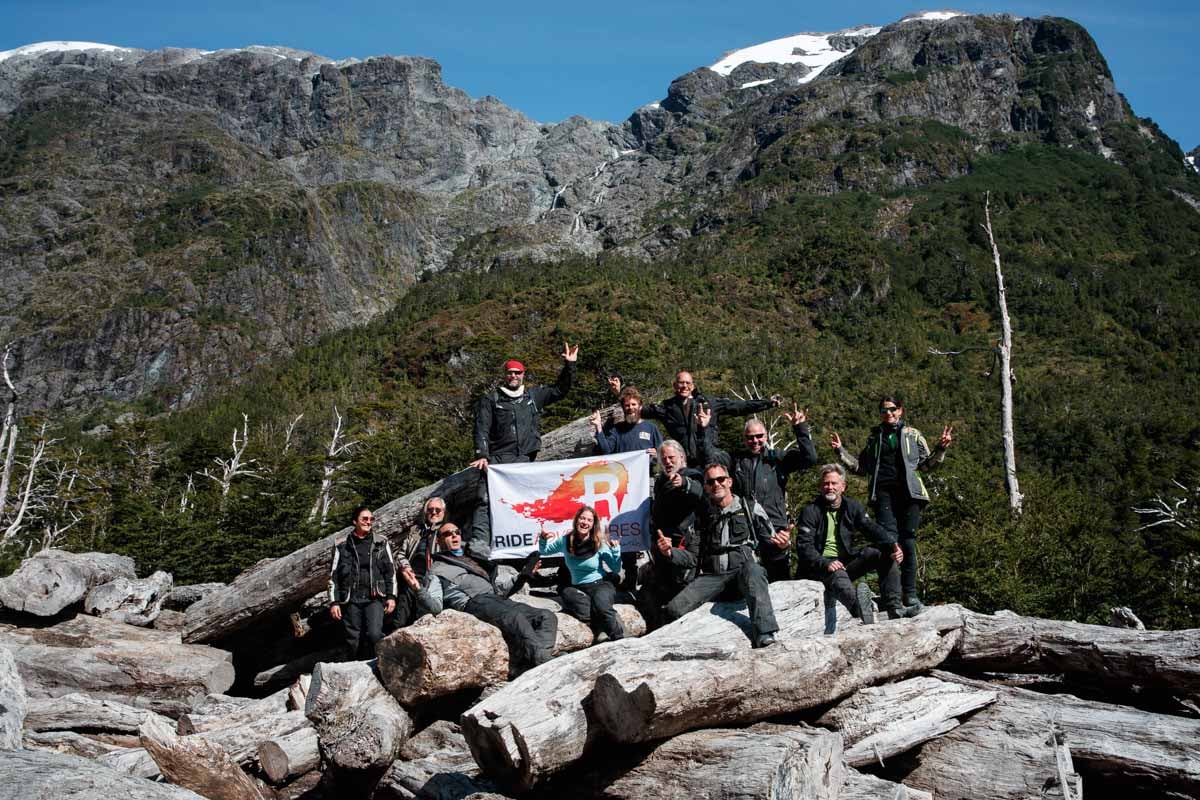 Eric and the team pose for a photo while on an adventure motorcycle tour in Patagonia.