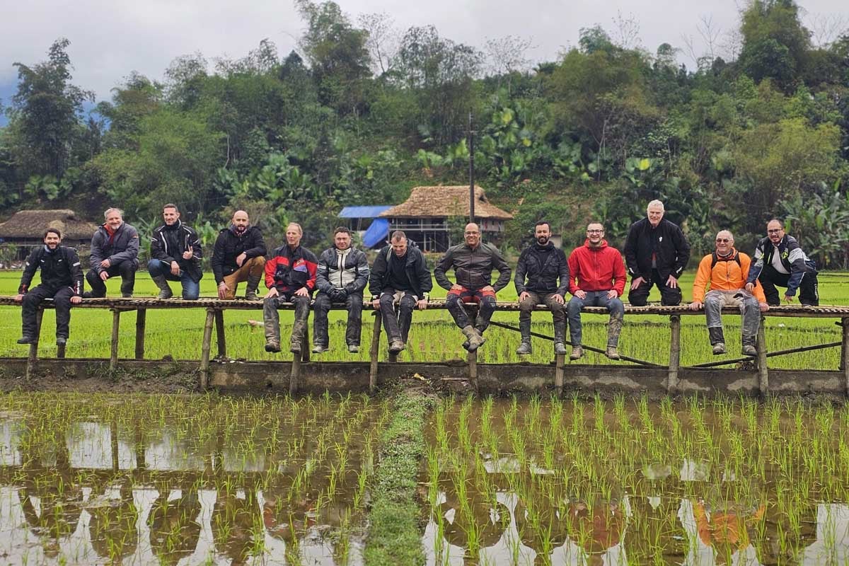 ride-customers-sitting-on-bamboo-bridge-vietnam