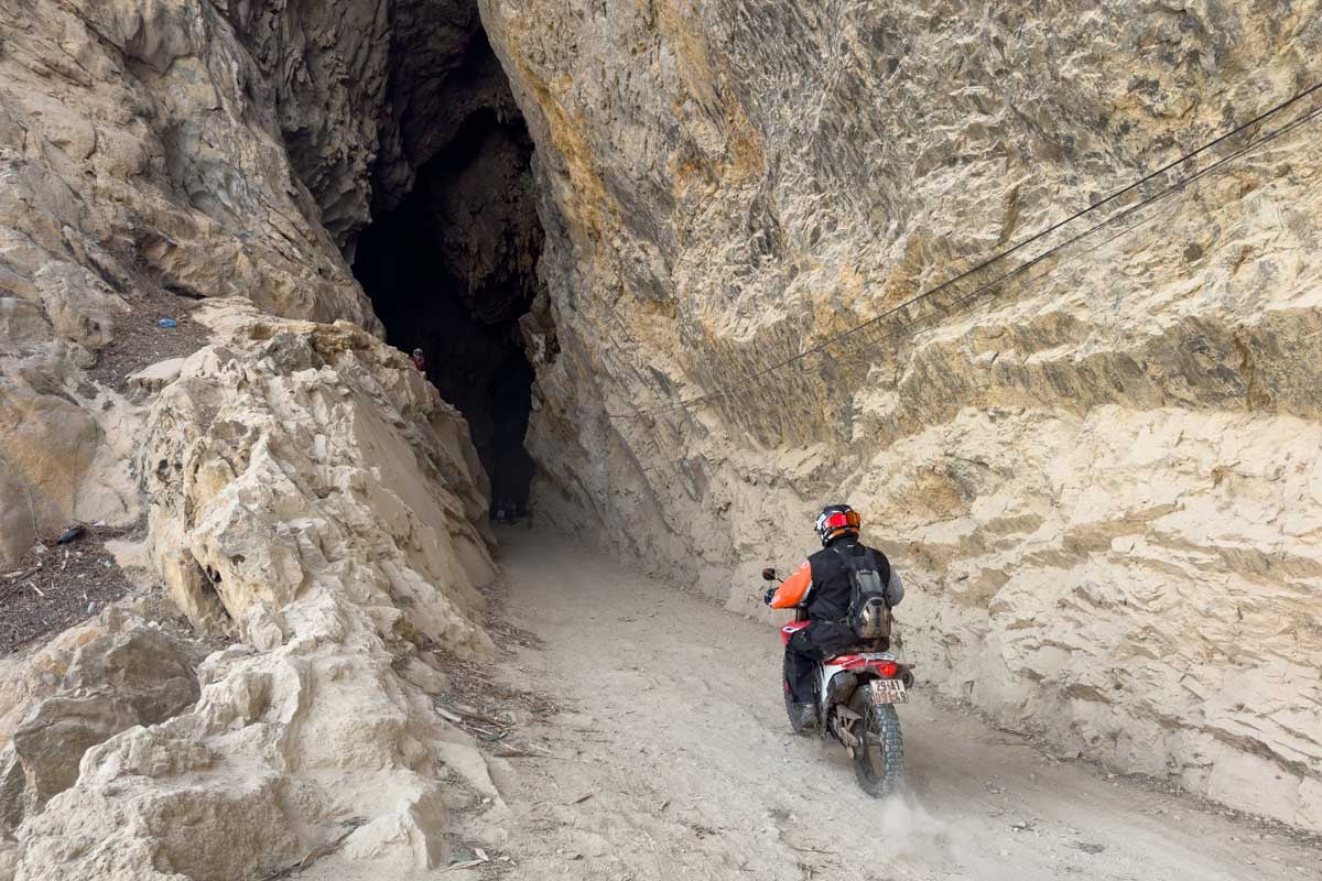 rider-entering-cave-vietnam-1