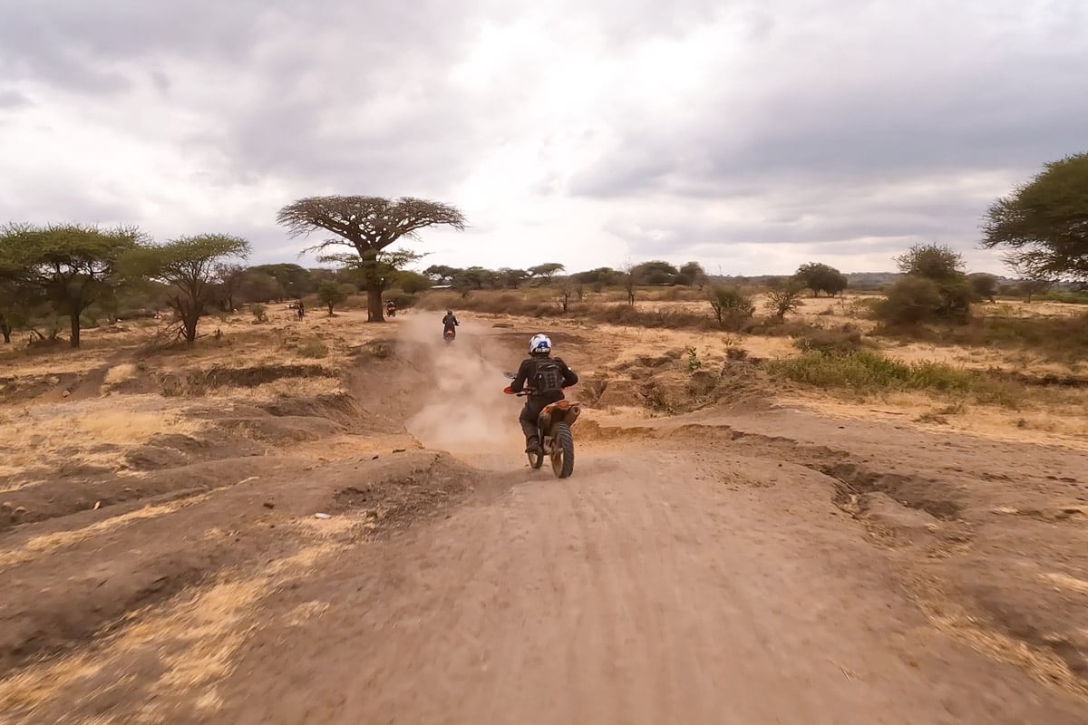 rider-motorcycling-down-a-revine-in-tanzania-africa