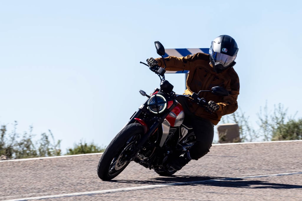 Rider hitting the twisties while wearing the Strata 2 motorcycle goggles.