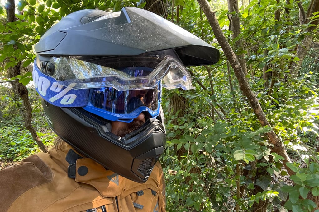 rider-wearing-agv-ax9-carbon-helmet