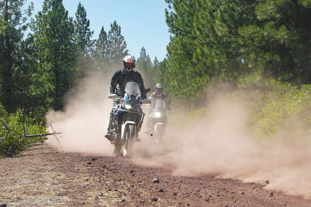 Some of our customers on our Africa Twins blazing through Oregon backcountry on Heidenau K60 Scouts.