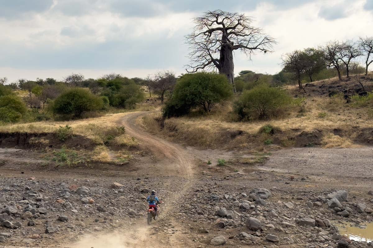 riding-through-the-african-landscapes-on-a-motorcycle-safari-in-tanzania