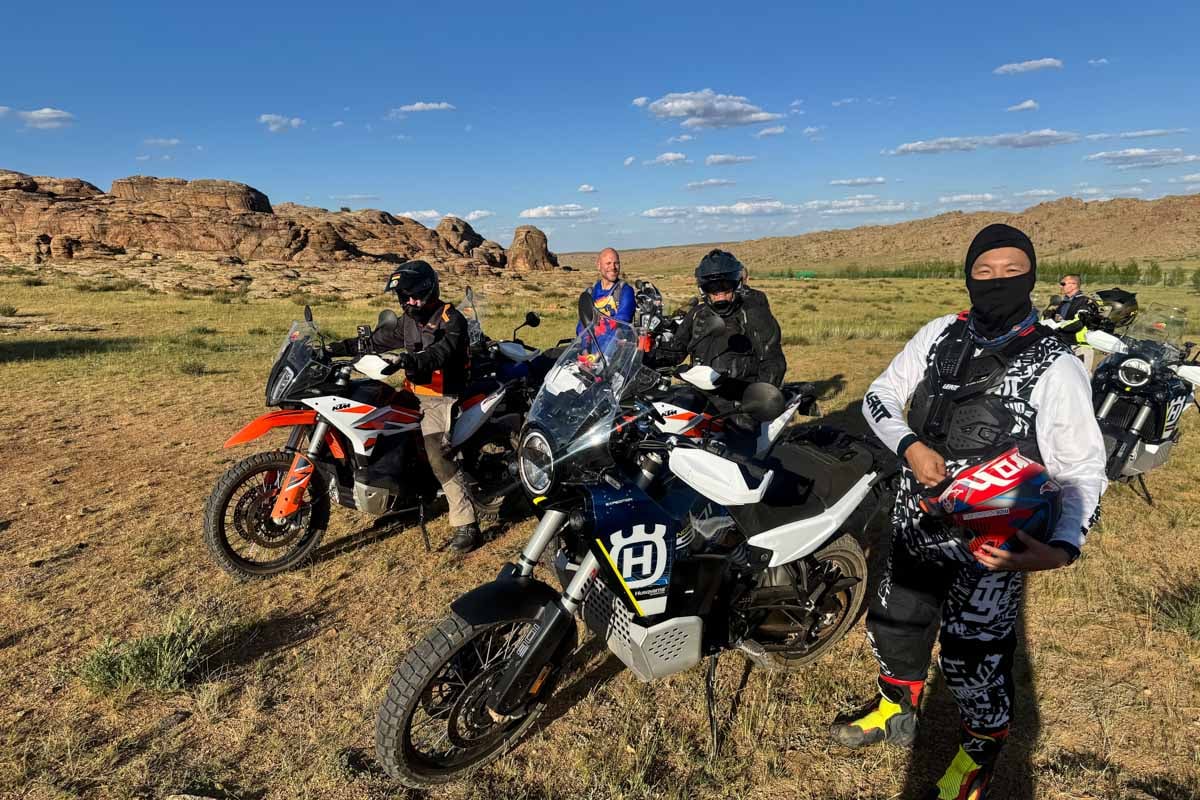 the crew taking a break between riding
