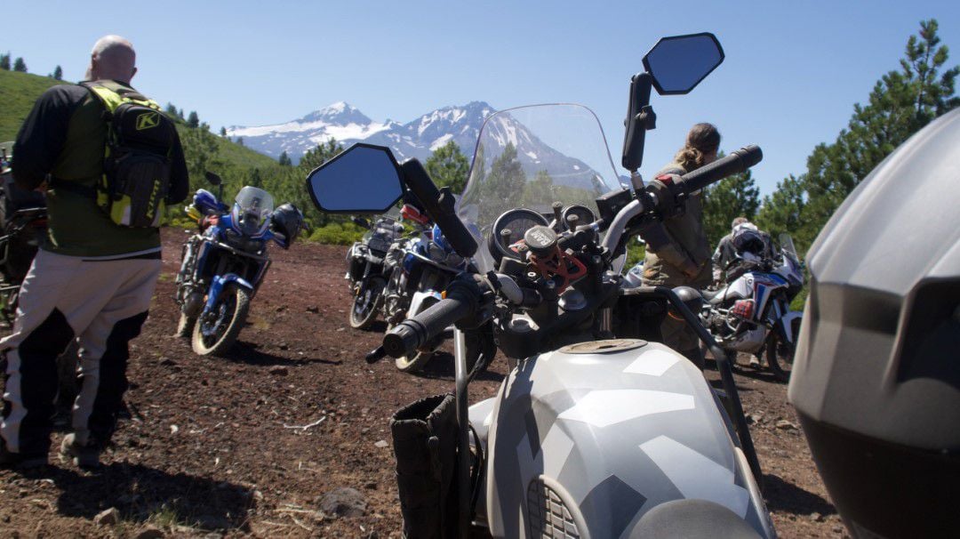 A Motorcycle with the doubletake mirrors attached while on a tour with us in Oregon.