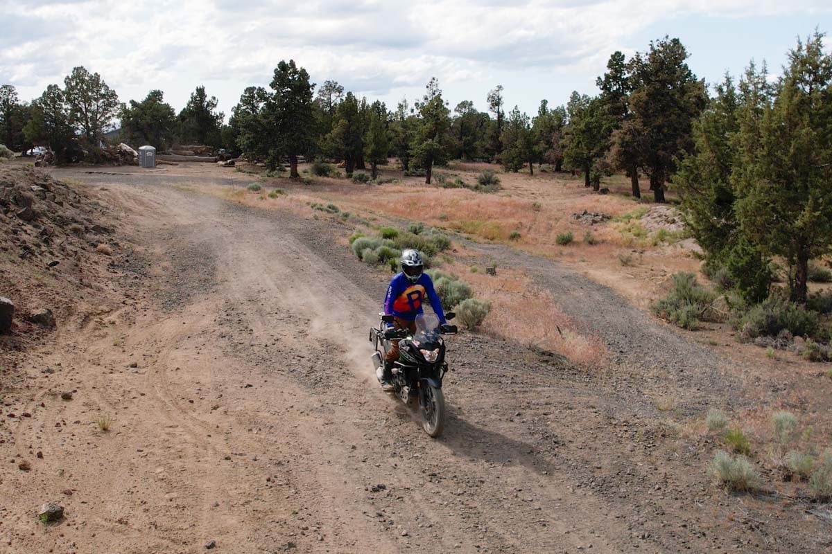 versys-x 300 in action down a dirt trail