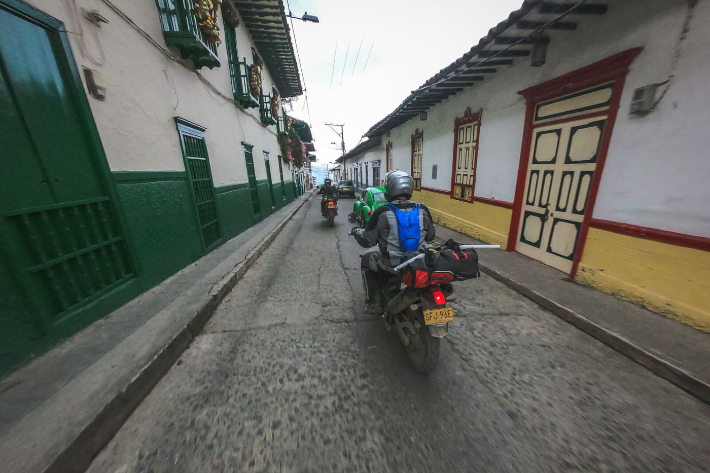 riding-though-village-colombia