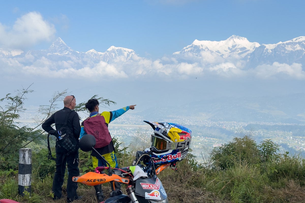showing-customers-the-himalayan-range-nepal.jpg